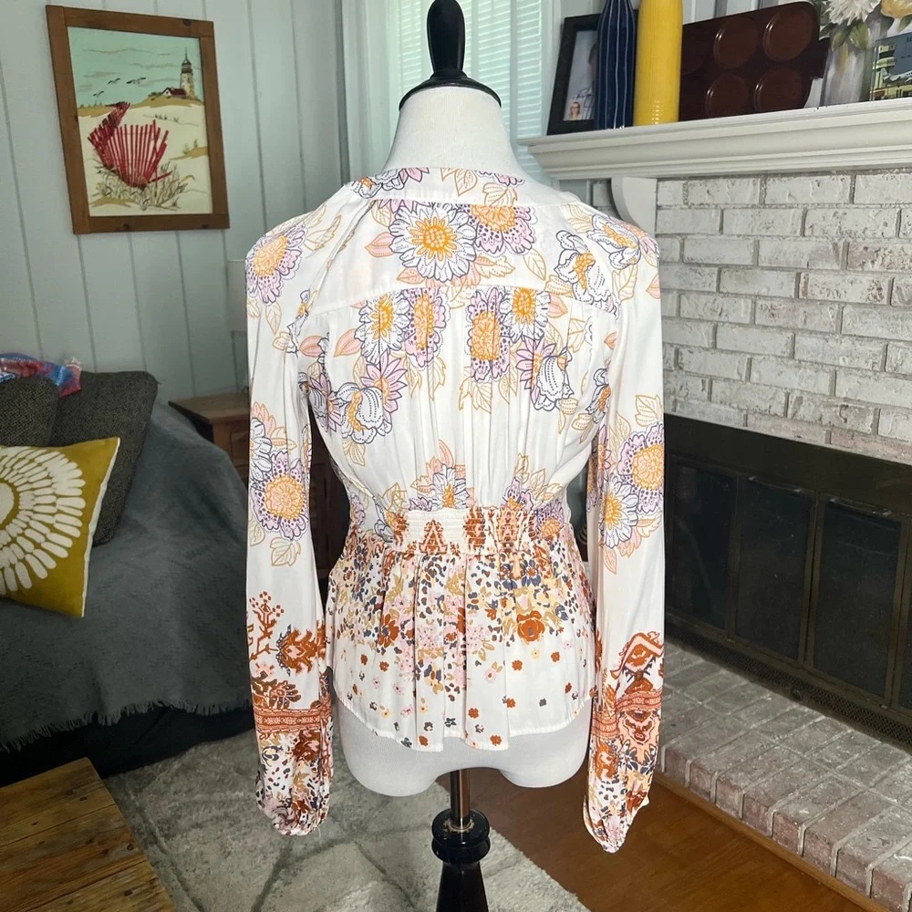 Free People run free balloon sleeve floral tie front button blouse